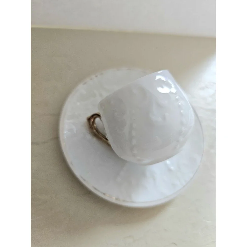 Vintage Miniature White Raised Design Cup And Saucer